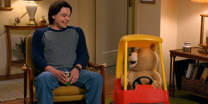 Ted and John sitting in the living room in Ted season 2