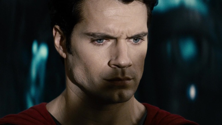 Henry Cavill's Superman looks down in closeup in Man of Steel