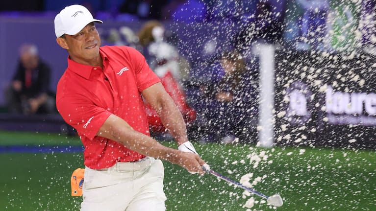 Tiger Woods of the Jupiter Links Golf Club plays a shot from a bunker on the eighth hole, during final day of TGL golf tournament, Tuesday, March 24, 2026