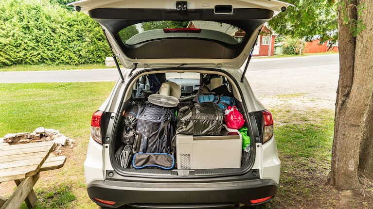 Travel on car with camping luggage packed at the full car trunk, holiday concept. (File image).