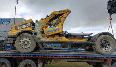 Driver cut from rolled-over racing truck