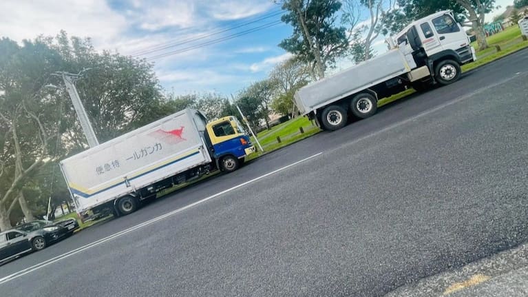 Trucks parked on a residential street in South Auckland.