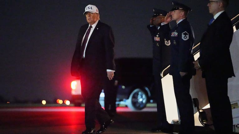 President Donald Trump disembarks Air Force One at Palm Beach International Airport in West Palm Beach, Fla., Friday, Feb. 27