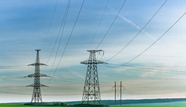 Power lines connecting utility towers.