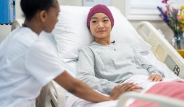 Physician and patient in a hospital room.