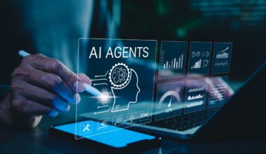 A hand holding a pen to a digital display with the text "AI Agents."