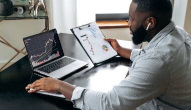 A person looks at data on a laptop.