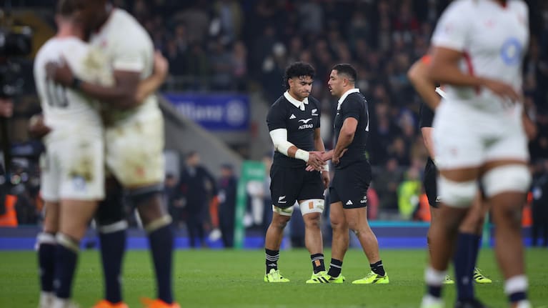 Wallace Sititi, left, and Anton Lienert-Brown shake hands after the All Blacks' defeat to England at Twickenham last year.
