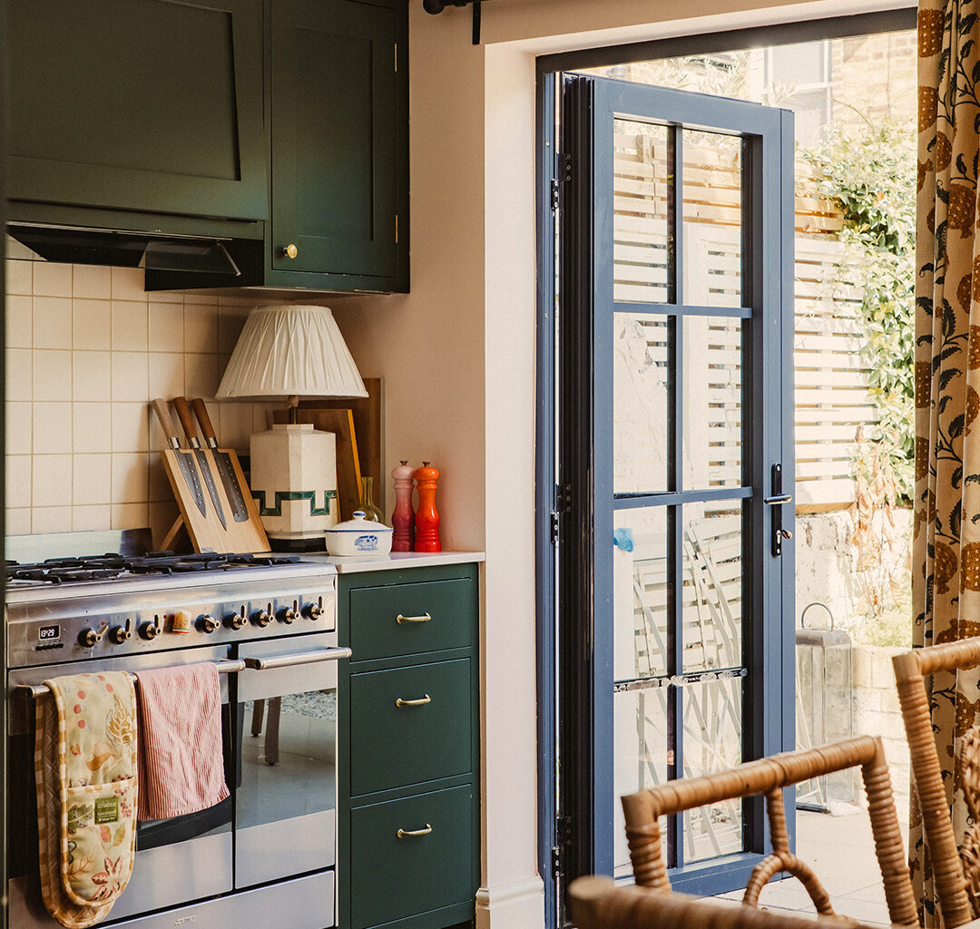 Cherry Red and Forest Green Live Harmoniously in This Charming London Home
