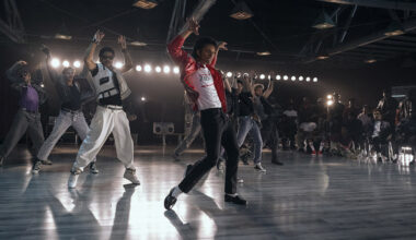 Jaafar Jackson (in red) plays his late uncle Michael Jackson in Michael, which likely will be a two-part feature.