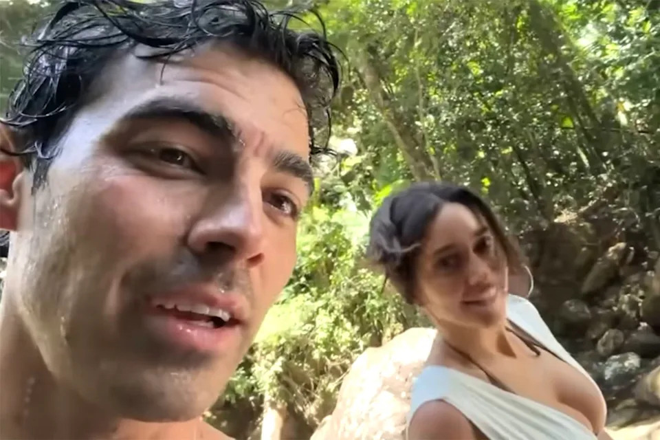 Joe Jonas and Tatiana Gabriela visit a waterfall in Puerto RicoCredit: Jonas Brothers/Youtube