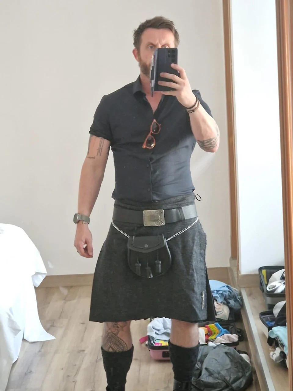 Gordy talking a selfie in a kilt