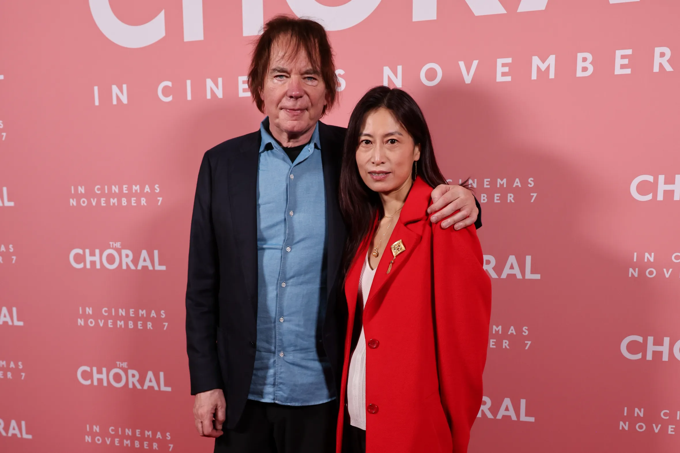 Julian Lloyd Webber and Jiaxin Cheng on the red carpet for "The Choral" film screening.