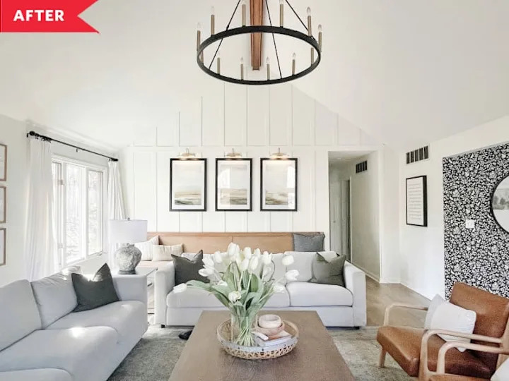 After: Bright living room with white walls with board and batten treatment on back wall