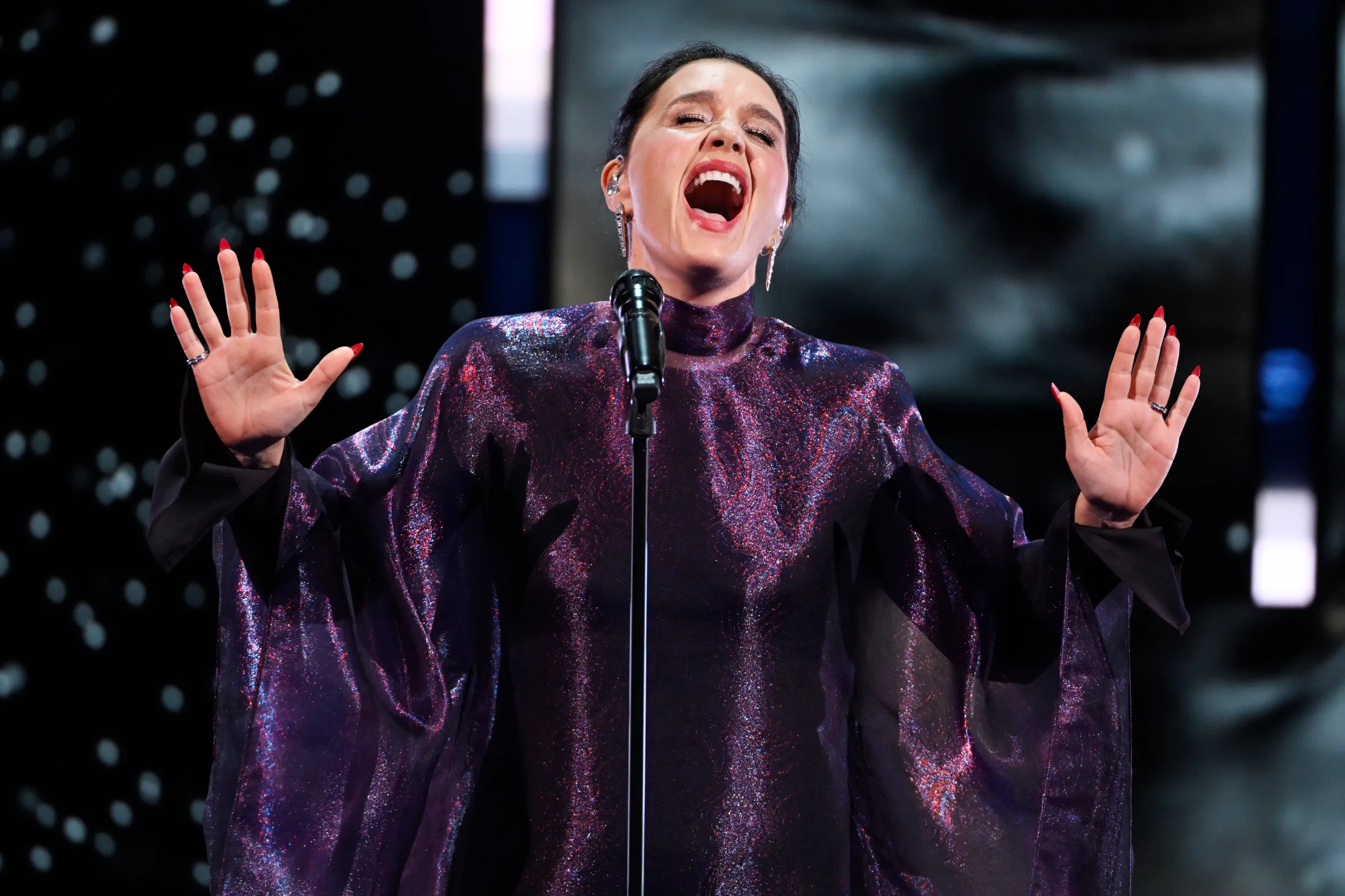 Jessie Ware performing on stage at the EE BAFTA Film Awards 2026.