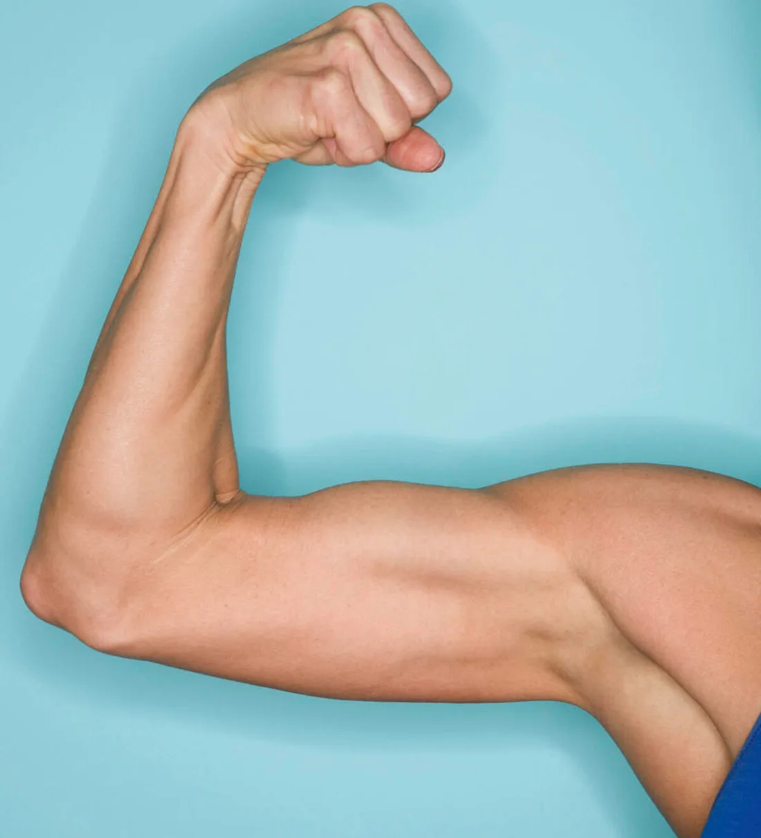 Close up photo of a muscly arm flexing