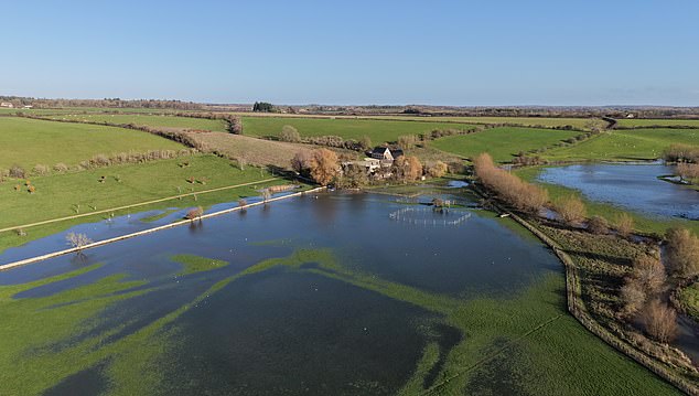 North of the home is a Roman bridge while a protected Roman villa and bath house is also near the proposed site (Pictured: Flooding at Ellen and Portia's property)