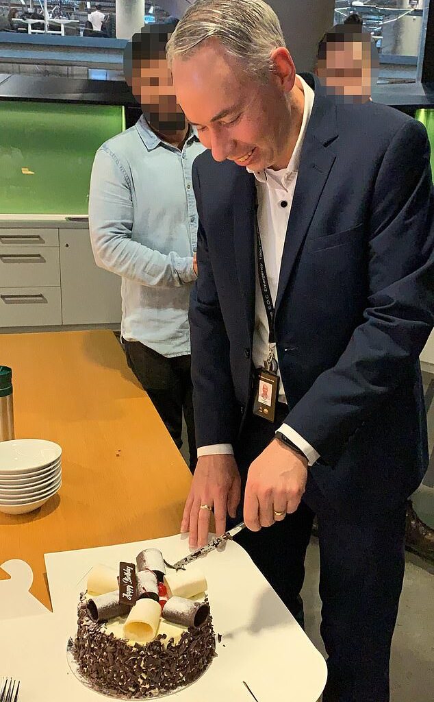 Former NAB employee John Horwood, 49, contemplated suicide on the rooftop of the bank's Melbourne skyscraper after being made redundant. He is seen celebrating his birthday at work