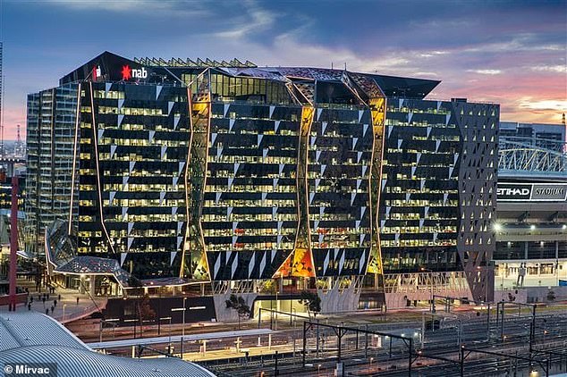 John had made sure his life insurance policy covered suicide by the time he went to the top of NAB's Docklands headquarters (pictured) on December 17 and sat there for 30 minutes