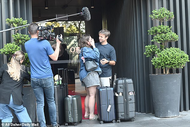 The pair embraced and shared a kiss outside their apartments, and at times appeared to be engaged in an intense conversation