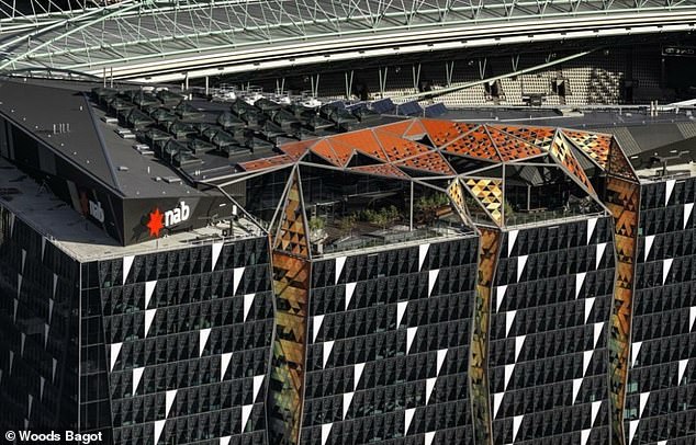 The worker from NAB's fraud department took his life from the roof of the bank's Docklands building (pictured) after a team meeting