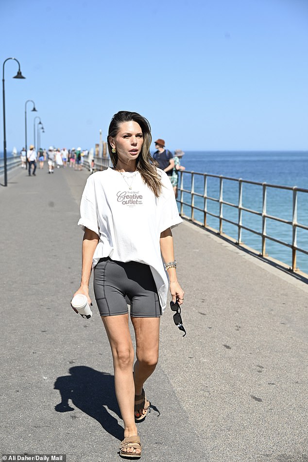 Married At First Sight's Bec Zacharia was spotted out and about after returning home to Adelaide following her heartbreaking Final Vows. Pictured: The outspoken reality star was seen taking a walk on Brighton Pier, one of Adelaide's famed tourist destinations