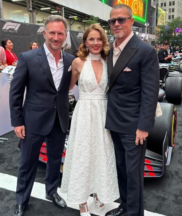 The couple pose with Brad Pitt during the F1 Movie premiere in June last year in Times Square, New York