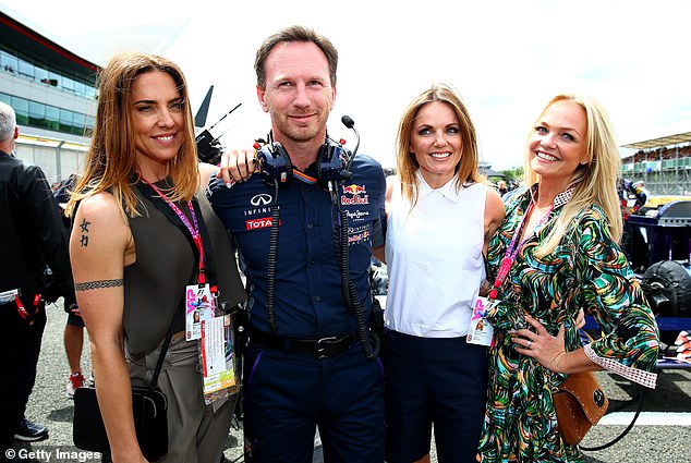 (L-R) Mel C, Christian Horner, Geri Halliwell and Emma Bunton pose before the 2015 Silverstone Grand Prix