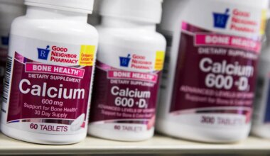 A photo of calcium supplements on the shelf of a pharmacy.