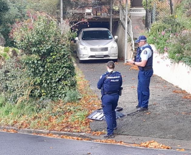 Armed police in Lancefield St. Photo: Tim Scott