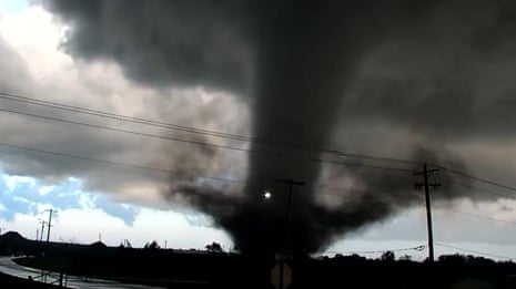 Tornado tears through homes and closes roads in northern Oklahoma – video