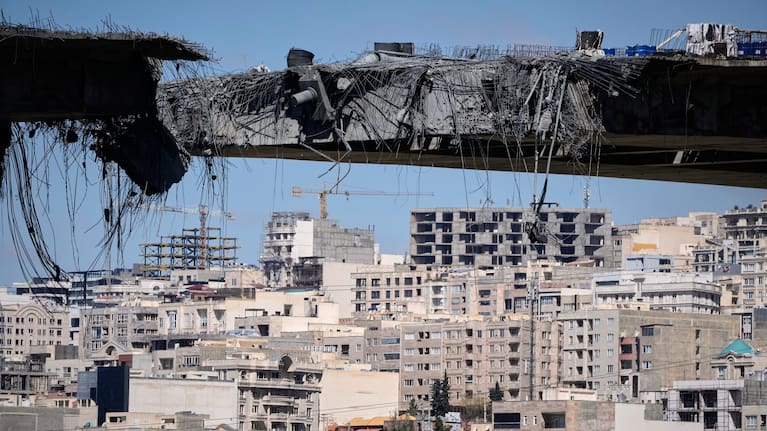 A bridge struck by US airstrikes on Thursday is seen in the town of Karaj, west of Tehran, Iran, Friday, April 3, 2026.