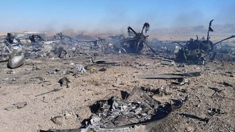 In this image provided by Sepahnews, the Iranian Revolutionary Guard's official website, wreckage is shown at what Iran's state TV claimed was the site of a downed American transport plane and two helicopters involved in a rescue operation, in Isfahan province, Iran, April, 2026.