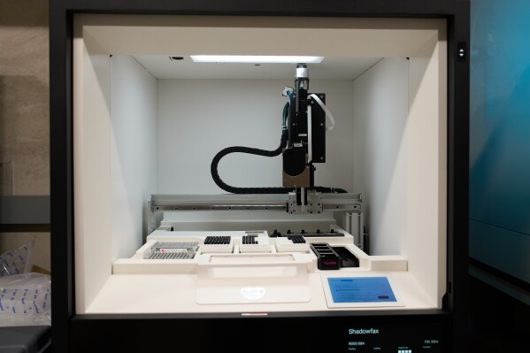 The Pacific Biosciences Revio, which can decode an entire human genome in one day, sits at the Salk Institute for Biological Studies in San Diego, Wednesday, Dec. 3, 2025. (AP Photo/Annika Hammerschlag)