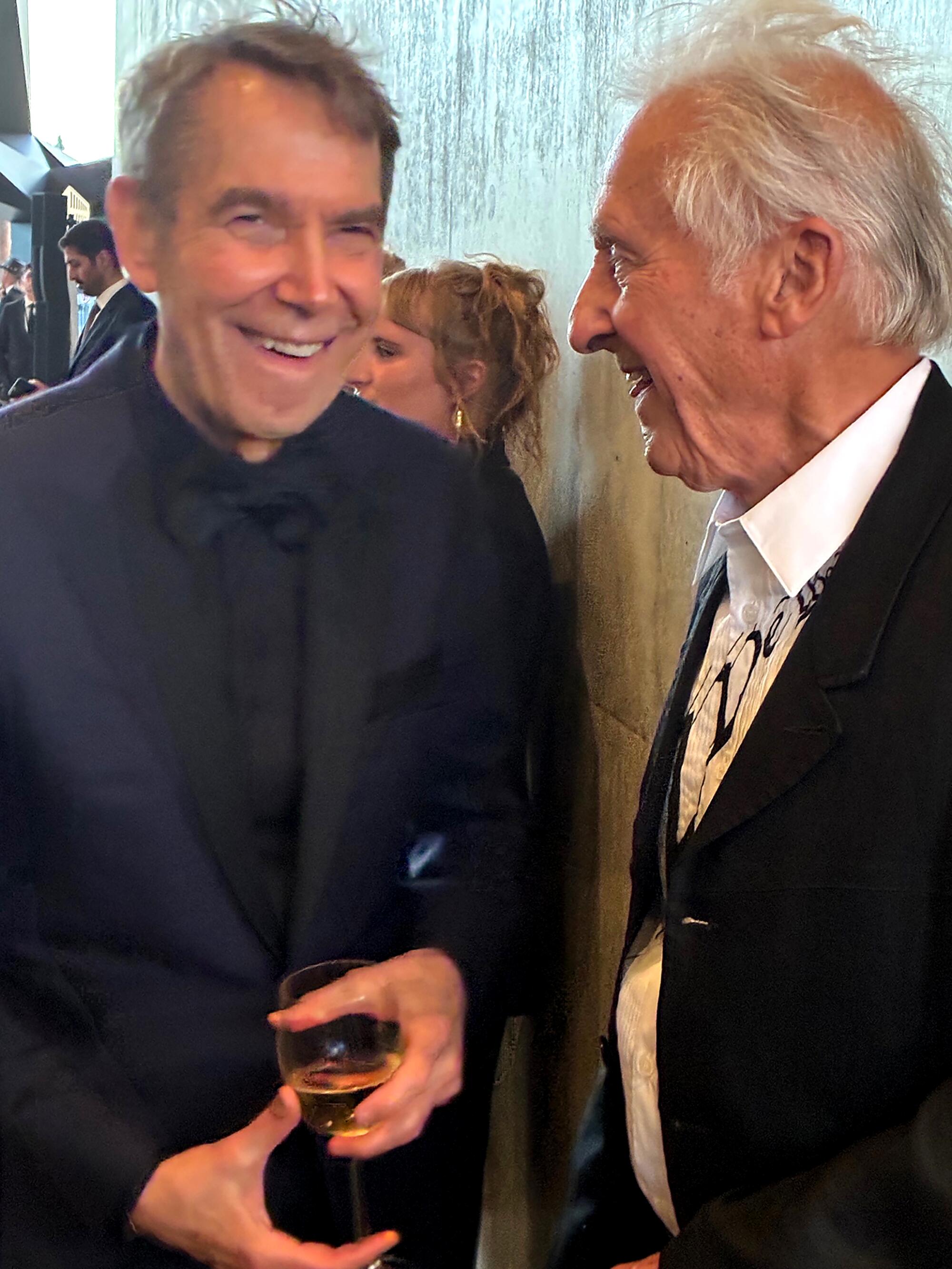 Jeff Koons talks with Ed Ruscha.
