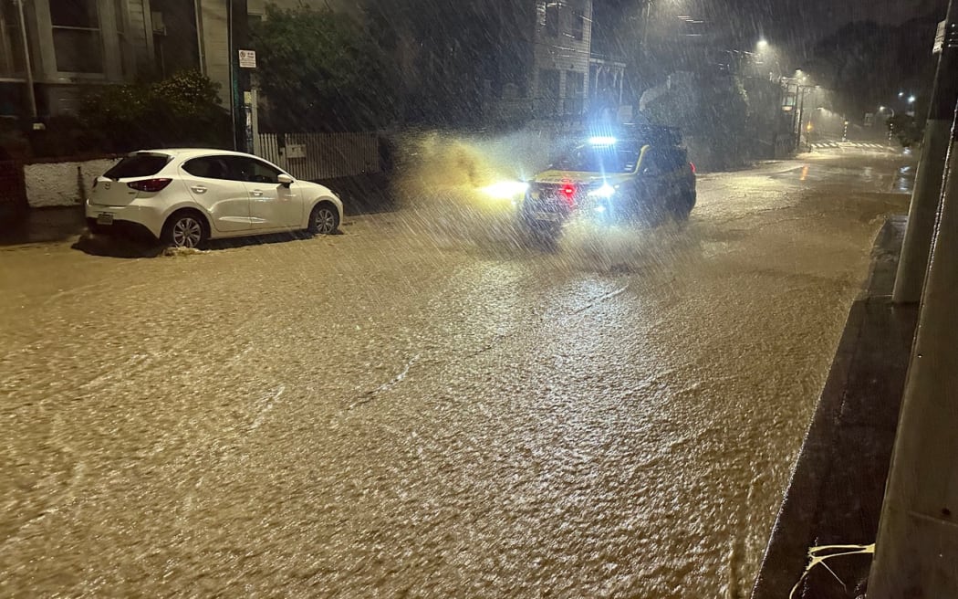 Mt Cook Wallace Street Hargreaves St and Wright Street floating vehicles where the Papawai Stream has overwhelmed the local stormwater network photos taken just after 4am