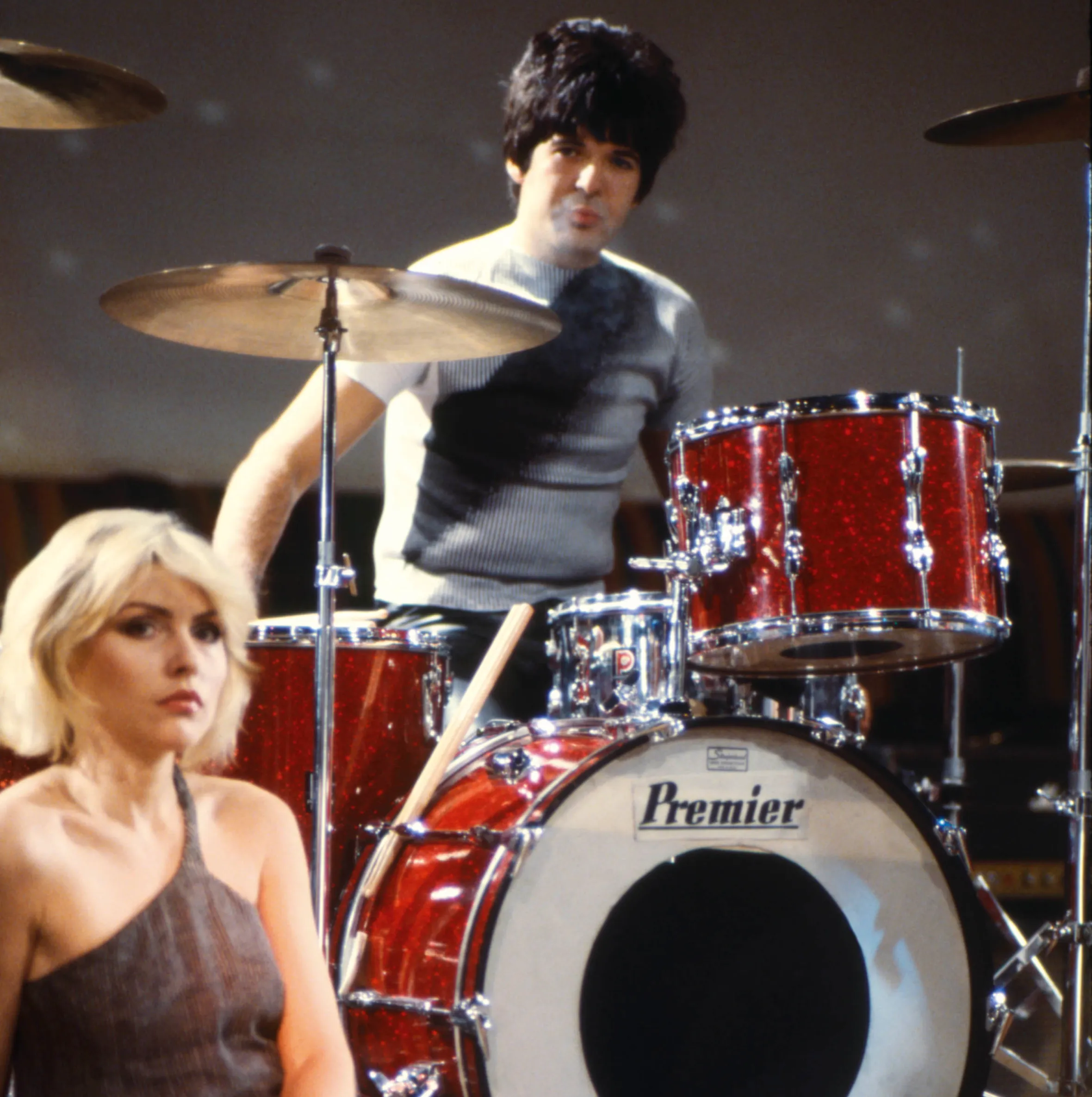 Debbie Harry and Clem Burke performing with a Premier drum kit on the set of the "Heart of Glass" video shoot.