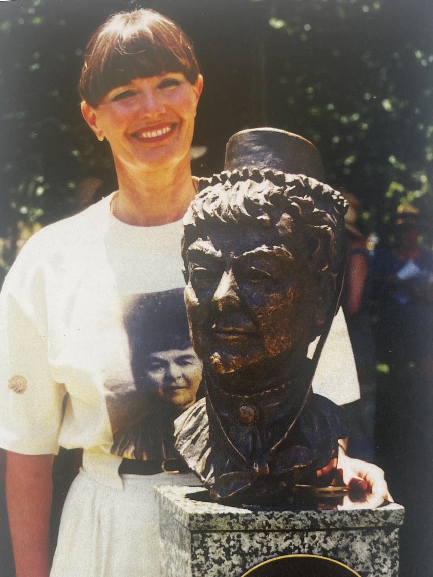 Pat Moseley with the bronze bust of women’s rights campaigner Mary Lee