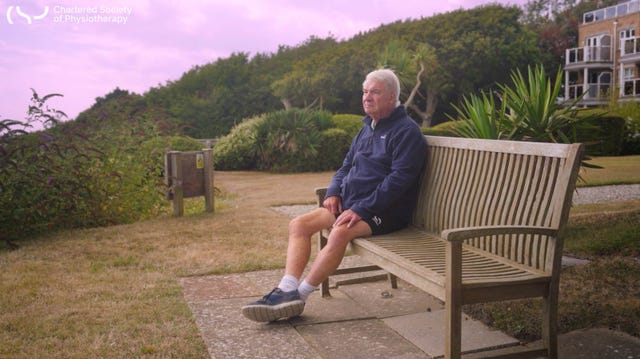 David Stadelman sitting on a bench outdoors