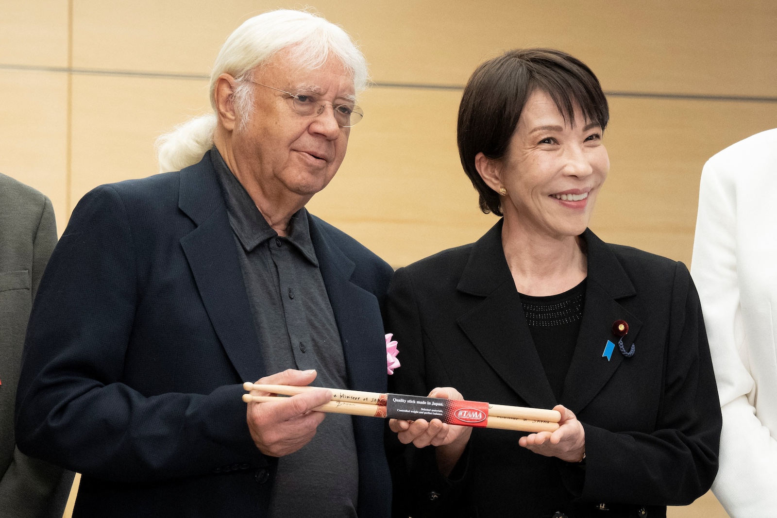 2026-04-10t065726z_1_lynxmpem390c5_rtroptp_4_japan-politics-takaichi-deep-purple.jpeg