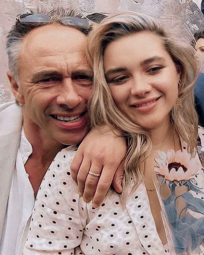 Clinton and Florence Pugh smiling.