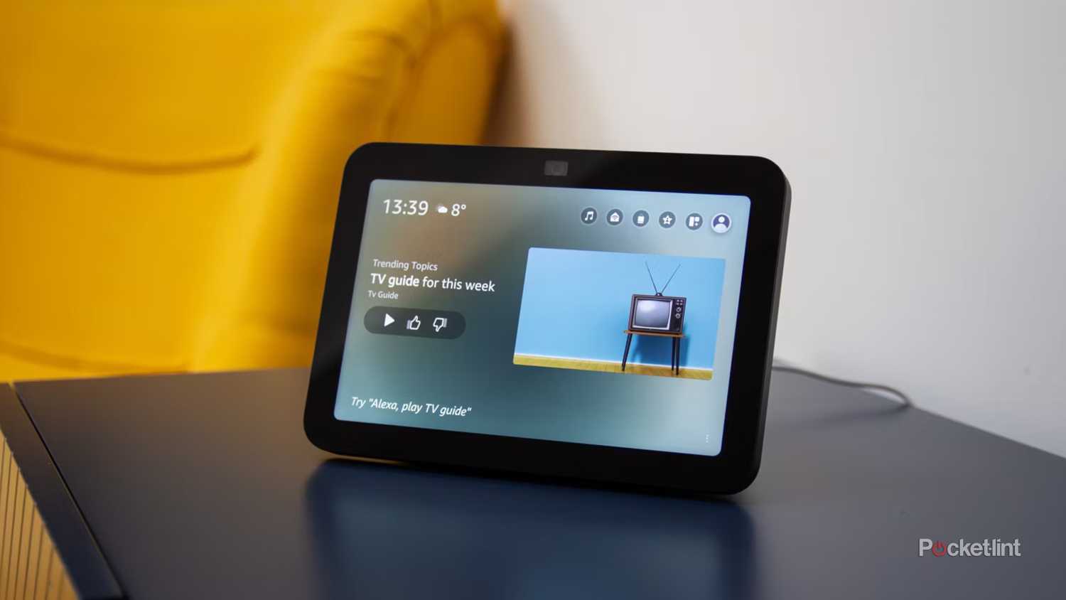An Amazon Echo Show 8 (3rd Gen) on an endtable.