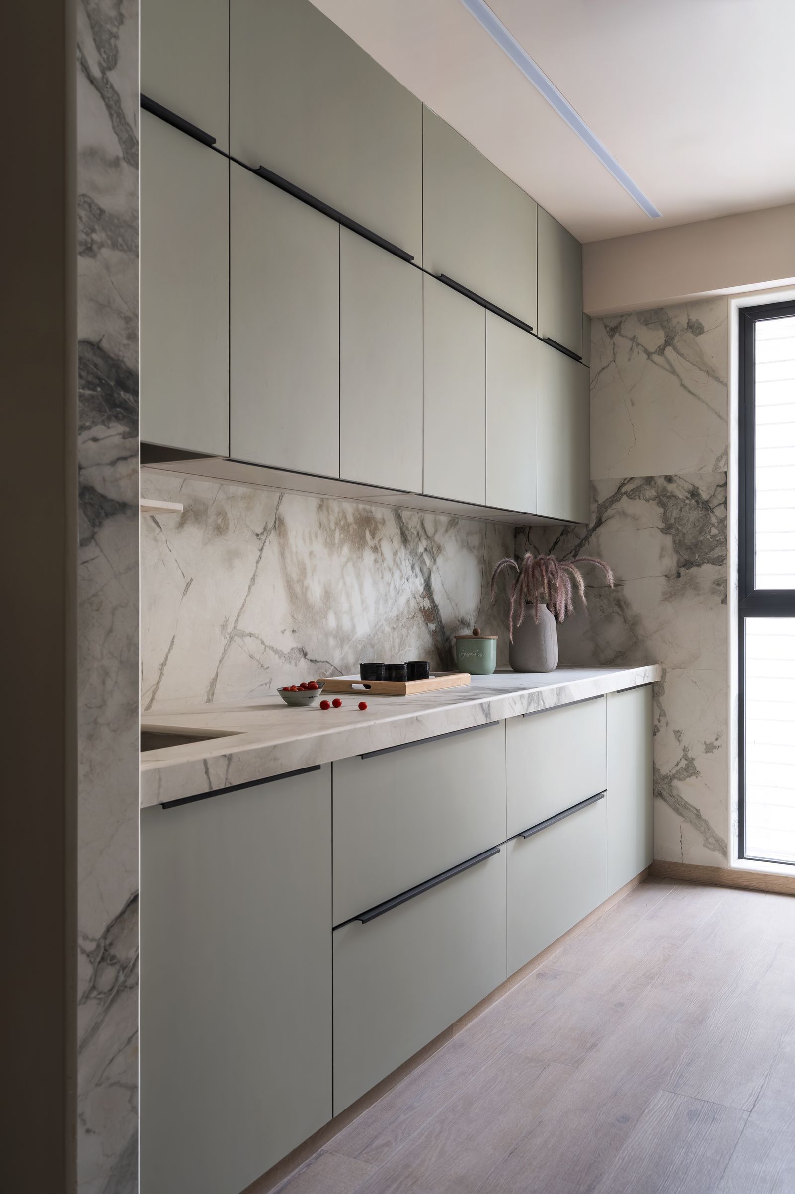 Image may contain Indoors Interior Design Kitchen Closet Cupboard and Furniture