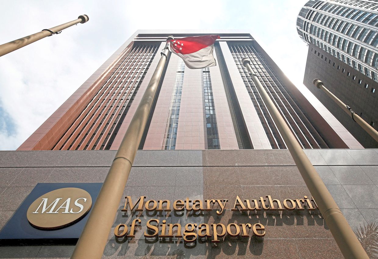MAS tightens policy for first time since 2022 