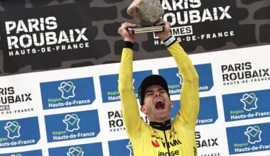 Winner Team Visma - Lease a Bike's Belgian rider Wout van Aert celebrates on the podium of the 123rd edition of the Paris-Roubaix