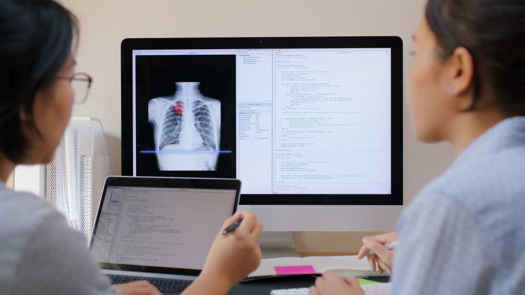 image of engineers working on AI healthcare solutions