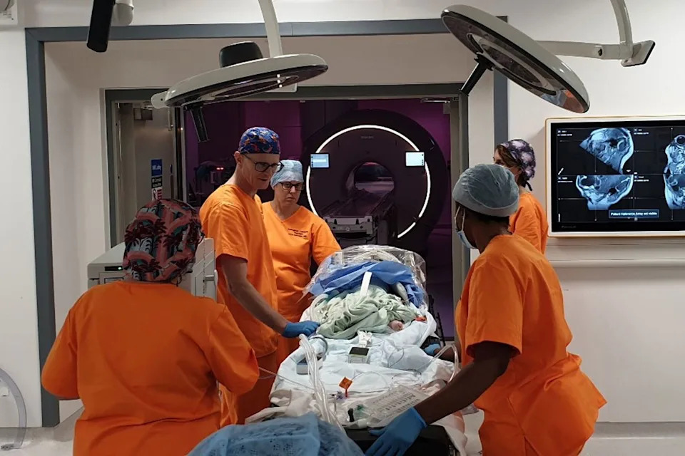 Nancy Dakin in surgeryCredit: swns