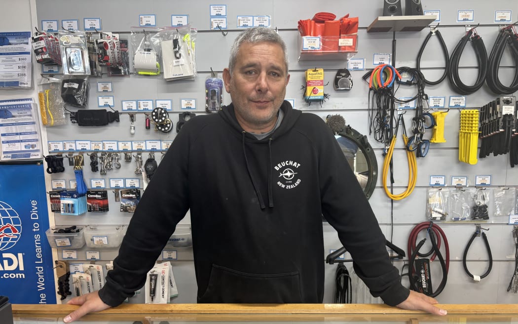 Dive Wellington owner Dave Drane says retail sales have dropped due to people being reluctant to dive in the ocean.