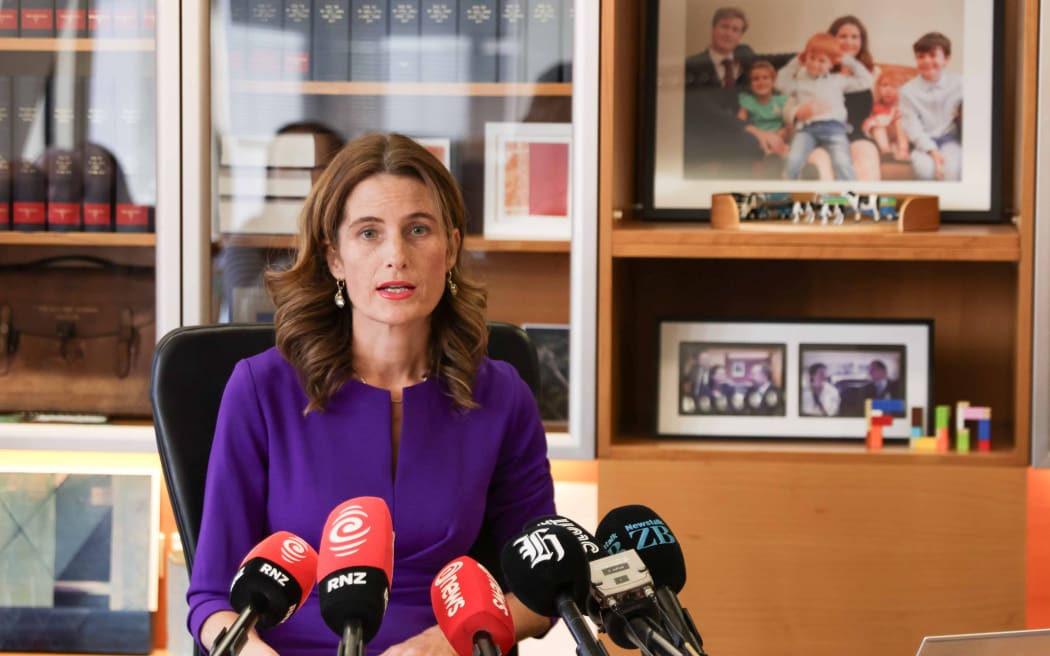 Finance Minister Nicola Willis faces questions as economic outlook downgraded.