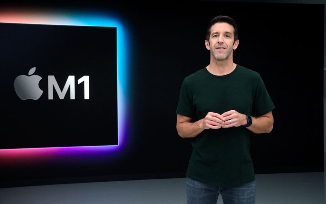 (FILES) This handout released and taken on November 10, 2020 by Apple inc. shows Apple's vice president of Hardware Engineering John Ternus unveiling  M1, the first chip designed specifically for the Mac during a special event at Apple Park in Cupertino, California. Apple announced on April 20, 2026 that CEO Tim Cook would step down in September, handing the chief executive job to company veteran John Ternus. (Photo by Handout / Apple Inc. / AFP) / RESTRICTED TO EDITORIAL USE - MANDATORY CREDIT "AFP PHOTO /Apple Inc. " - NO MARKETING - NO ADVERTISING CAMPAIGNS - DISTRIBUTED AS A SERVICE TO CLIENTS